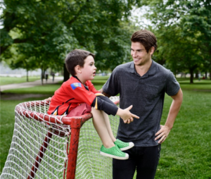 boys chatting near a hockey net BBBSC